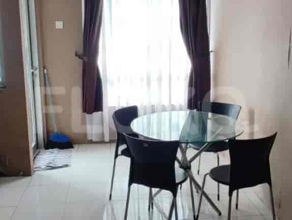 Dining area with a table and chairs.