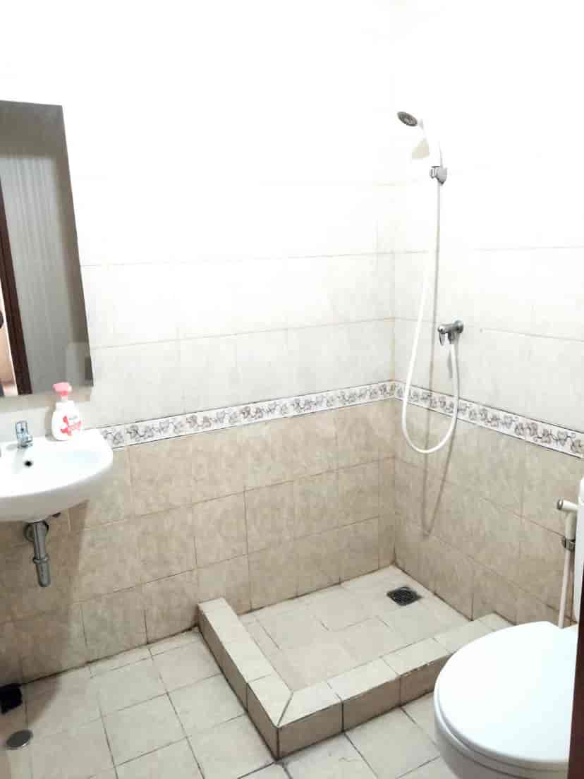 A bathroom with a shower.