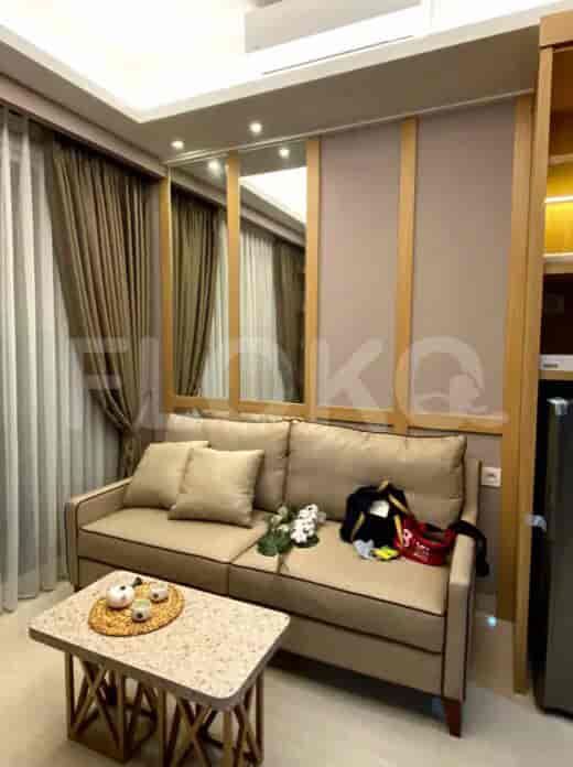 Living room with sofa and coffee table.