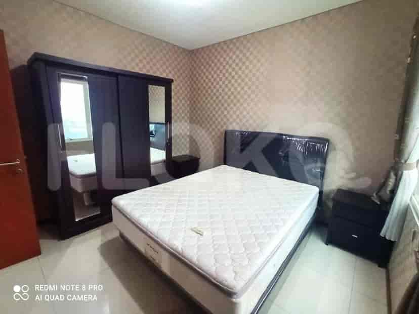 Another angle of the cozy bedroom with a queen bed.
