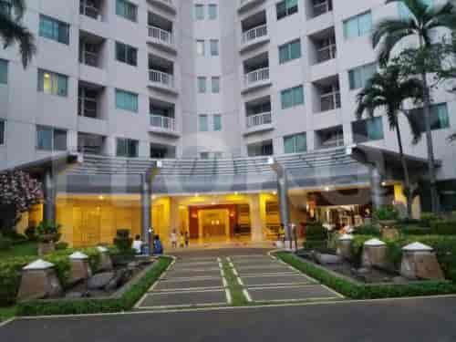 An apartment building exterior with a welcoming entrance.
