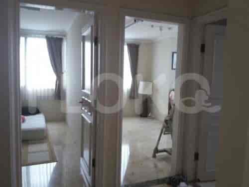 An interior shot showing the entrance, hallway, and doorways leading to different rooms.