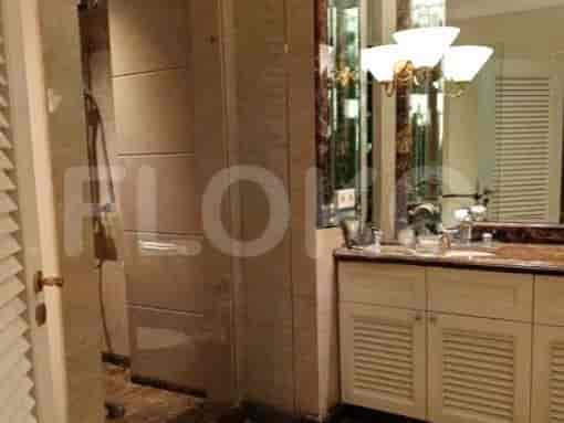 Bathroom with a sink, mirror, and cabinet.