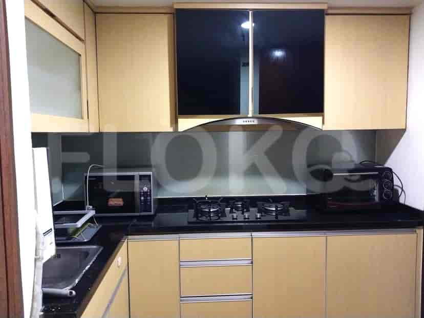 Modern kitchen with cabinets, gas stove, and built-in appliances.