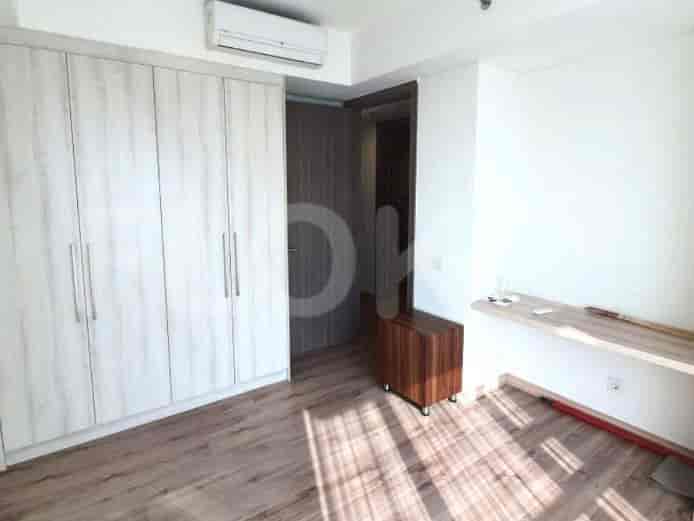 Bedroom with a closet and air conditioning.