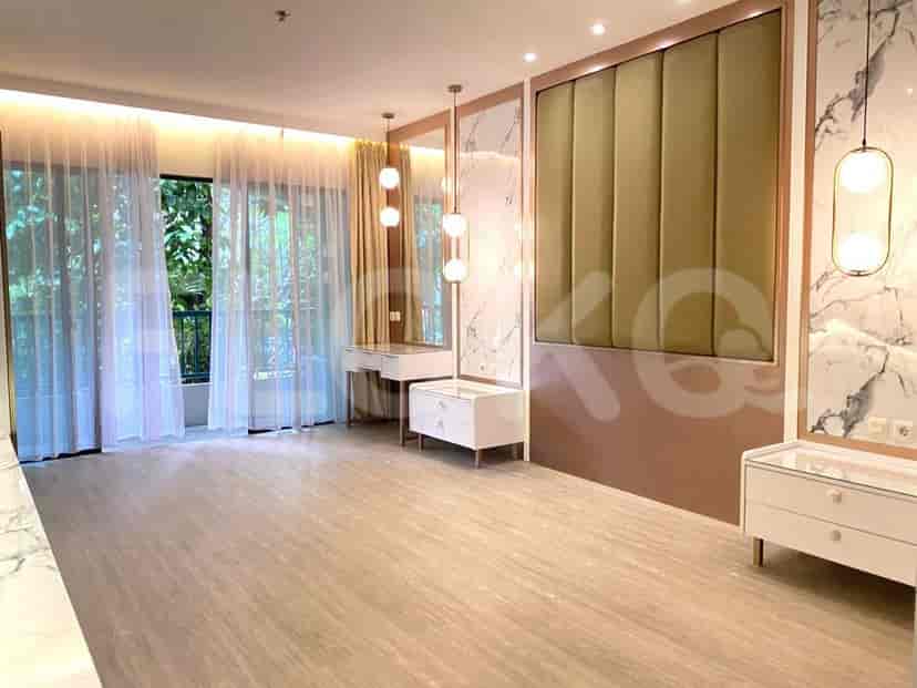 Luxurious master bedroom with a large bed, mirror, and bedside tables.