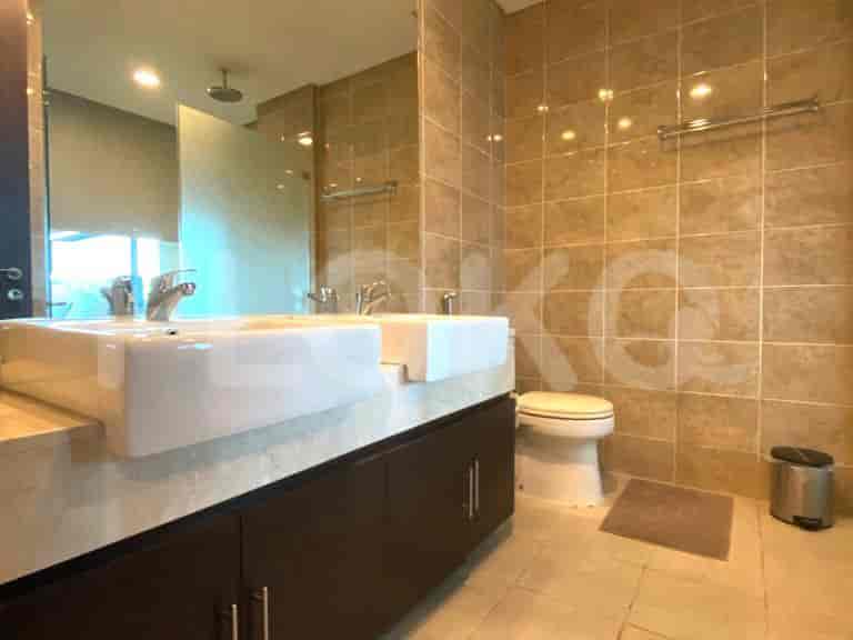 A well-lit bathroom with a modern design.