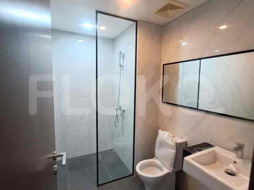 Modern bathroom with a glass shower.
