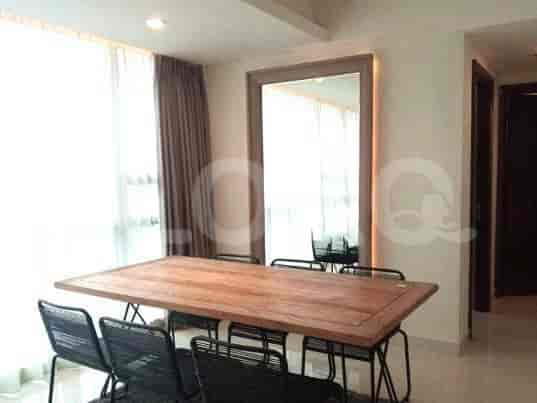 Dining area with a wooden table and chairs.