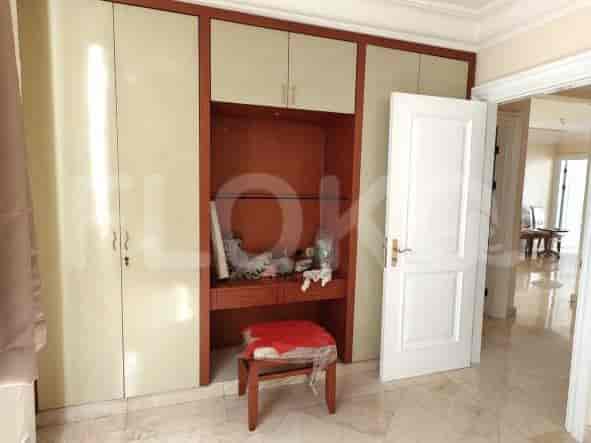 A closet with a vanity.