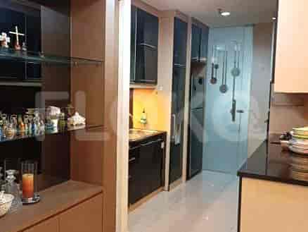 Modern kitchen with cabinets, appliances, and shelving.