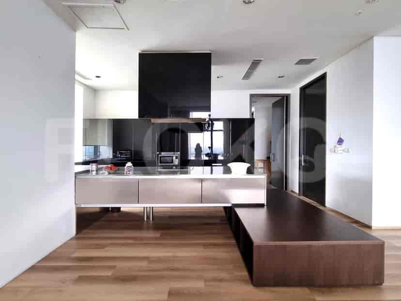 Modern kitchen with a sleek design, featuring high-end appliances.