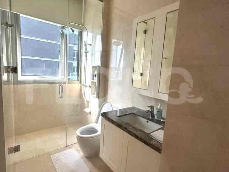 Modern bathroom with shower and vanity.