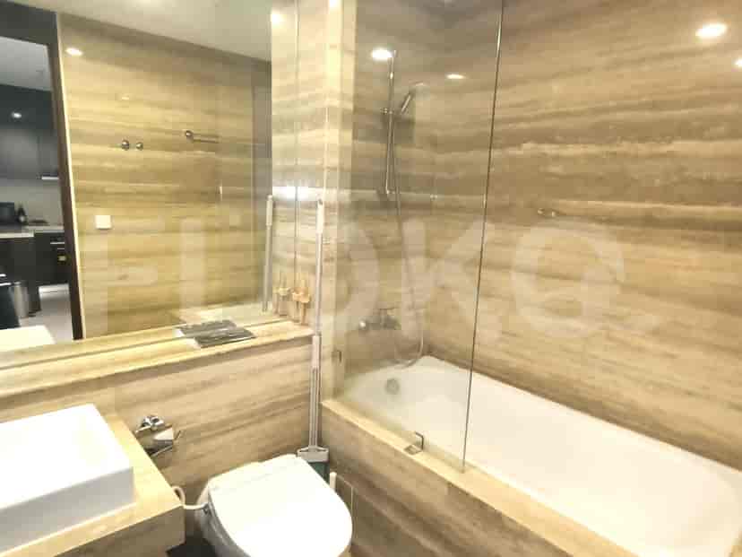 A luxurious bathroom with a bathtub and shower.
