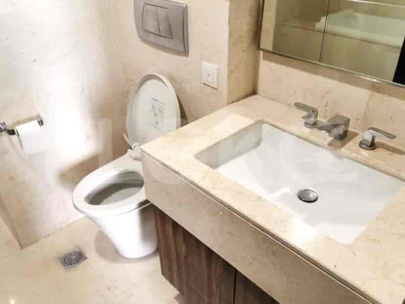 Bathroom with a toilet and a sink.