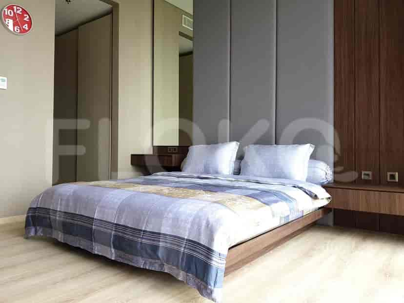 Contemporary bedroom with a double bed, wooden accents, and a modern design.