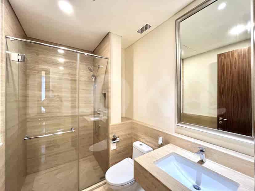 A modern bathroom with a shower and contemporary design.