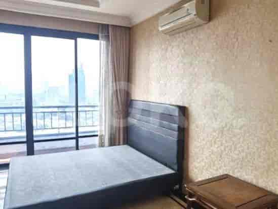 Bedroom with a bed, curtains, and air conditioning unit.
