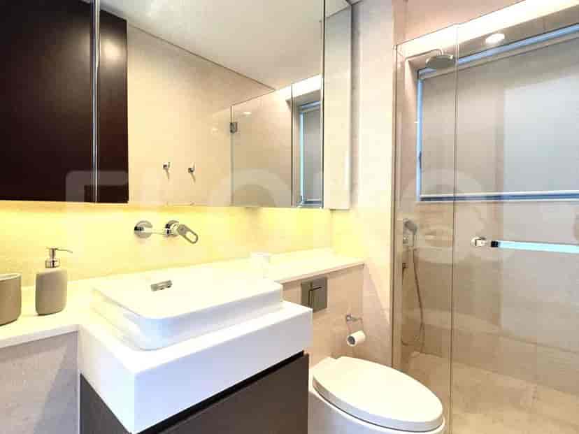 Bathroom featuring a modern sink, walk-in shower, and contemporary design.