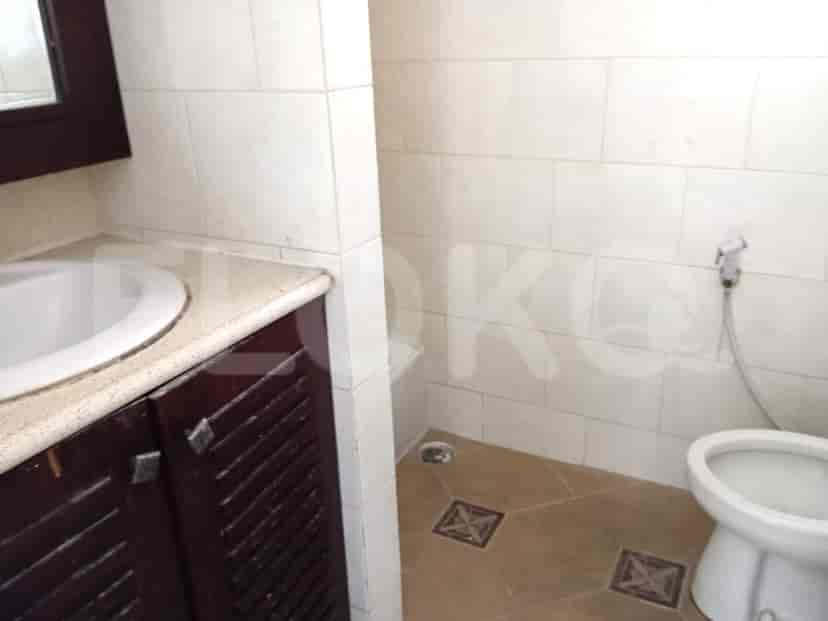 A small bathroom with a sink and toilet.