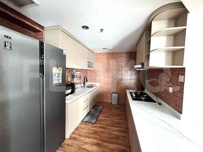 Kitchen with modern appliances, countertops, and cabinetry.