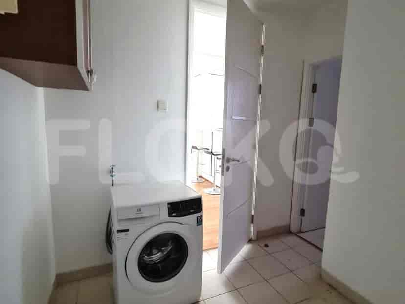 Laundry room with a washing machine.