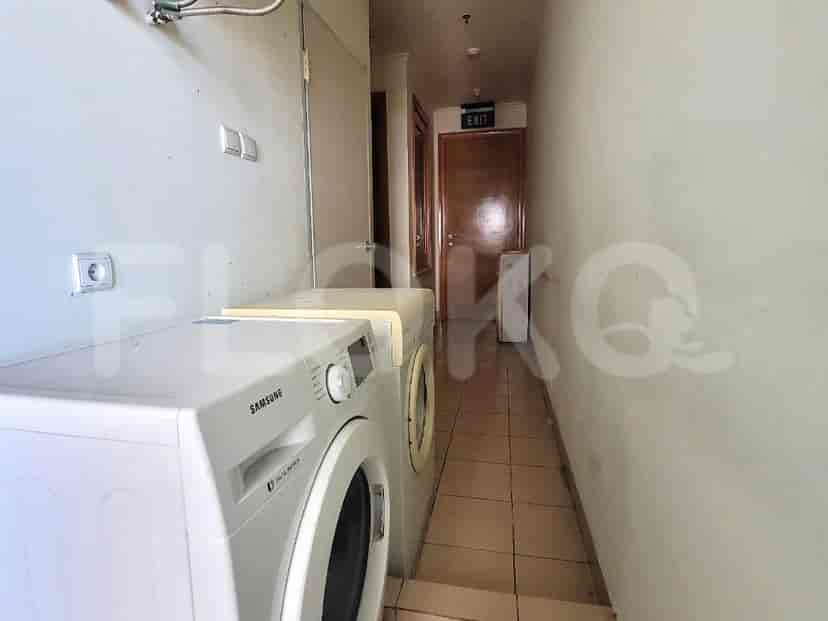 Laundry room with a washing machine and dryer.