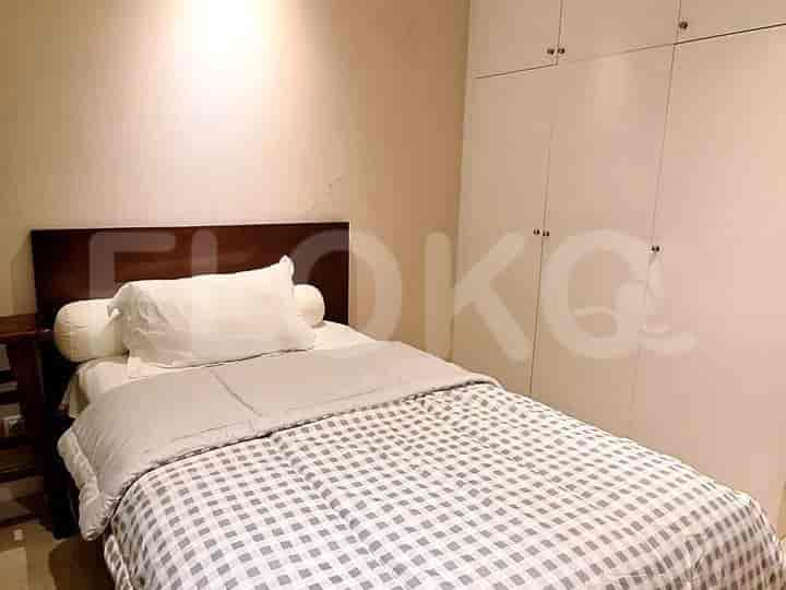 Cozy bedroom with a single bed and wardrobe.