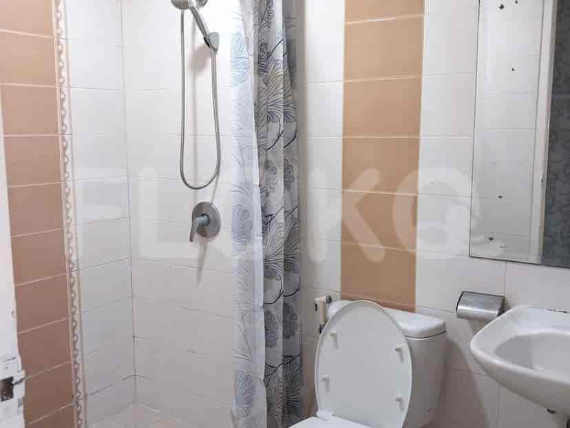 Bathroom with a shower and a toilet.