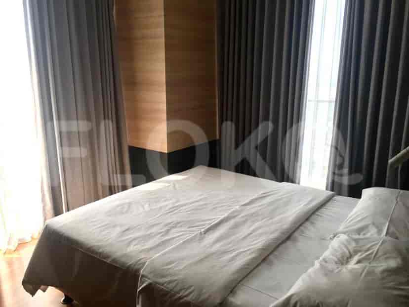 Another view of the bedroom with a double bed and matching curtains.