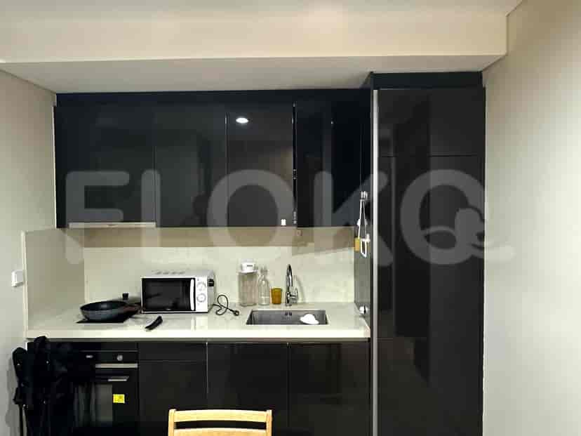 Modern kitchen with black cabinets.