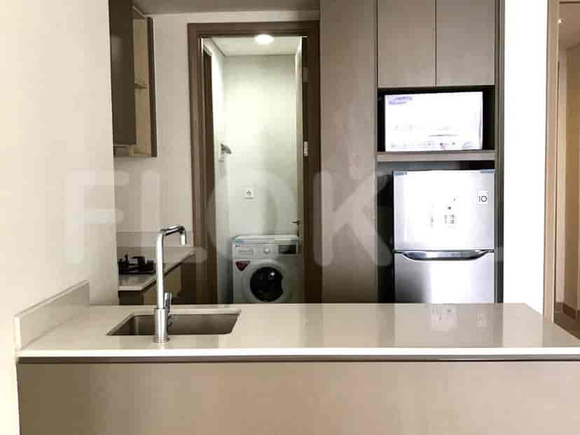 A compact kitchen with modern appliances.