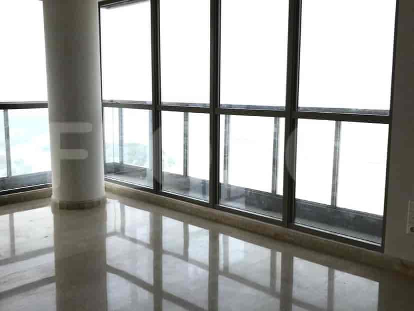 The corner living area has floor-to-ceiling windows and views.