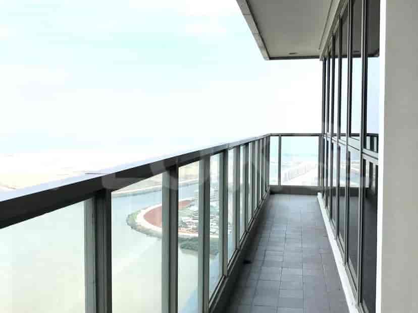 A small balcony with city views.