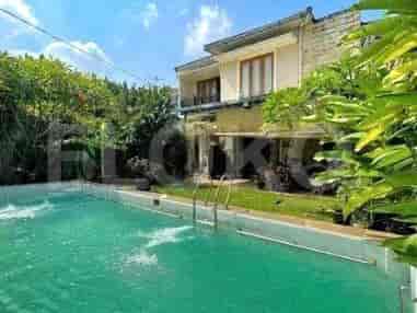 Exterior view showing a swimming pool, garden, and a modern house.