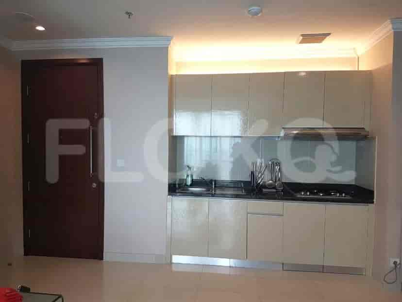 Modern kitchen with cabinets and appliances.