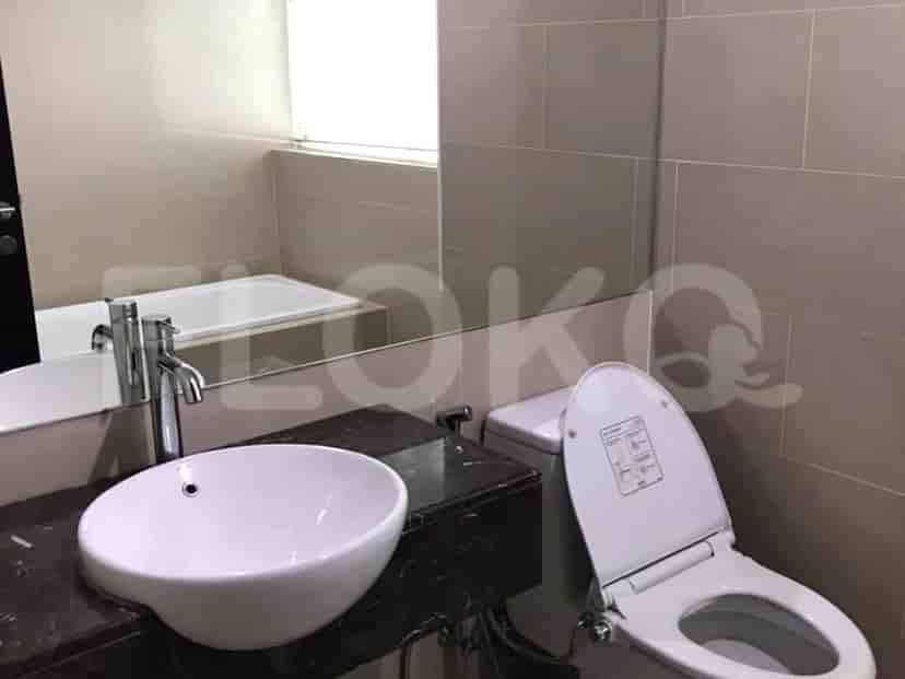Another bathroom view, showing a toilet, sink, and bathtub.