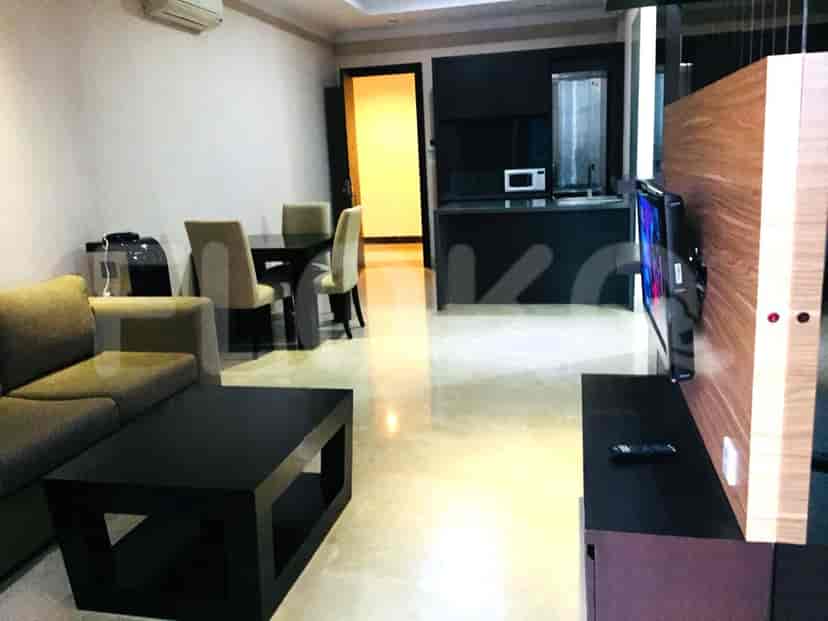 A combined living room and open kitchen area.