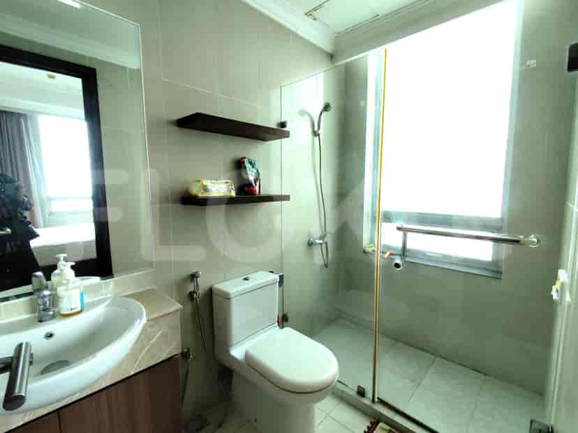 Bathroom with a sink, mirror, and shower.