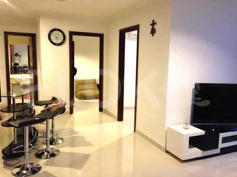Hallway with doors and decorative elements.