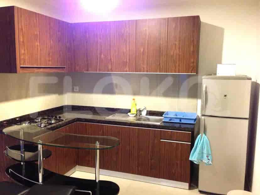 A well-equipped kitchen with wood cabinetry.
