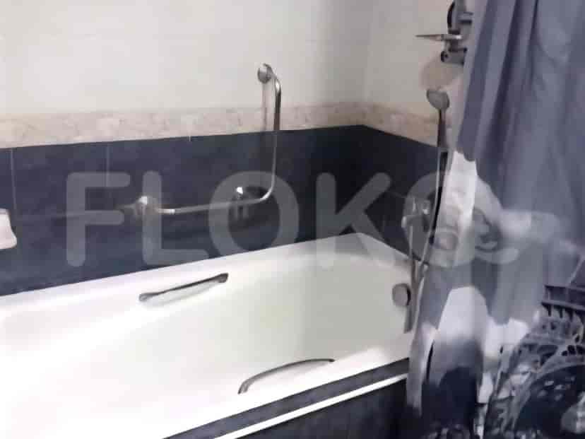 Bathroom with a bathtub and shower.