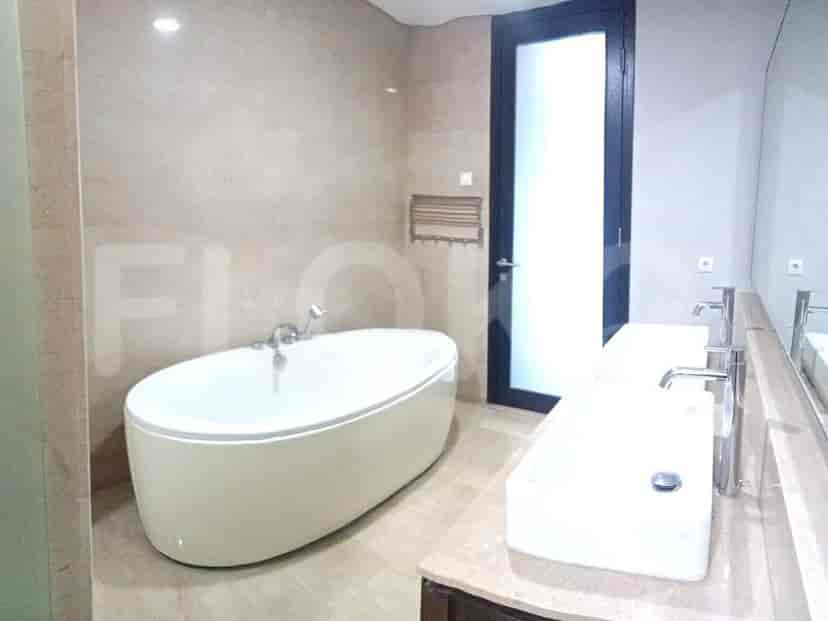 Master bathroom with a bathtub.