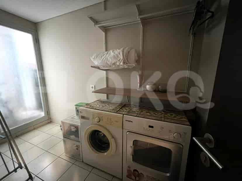 Laundry area with washing machine and dryer.
