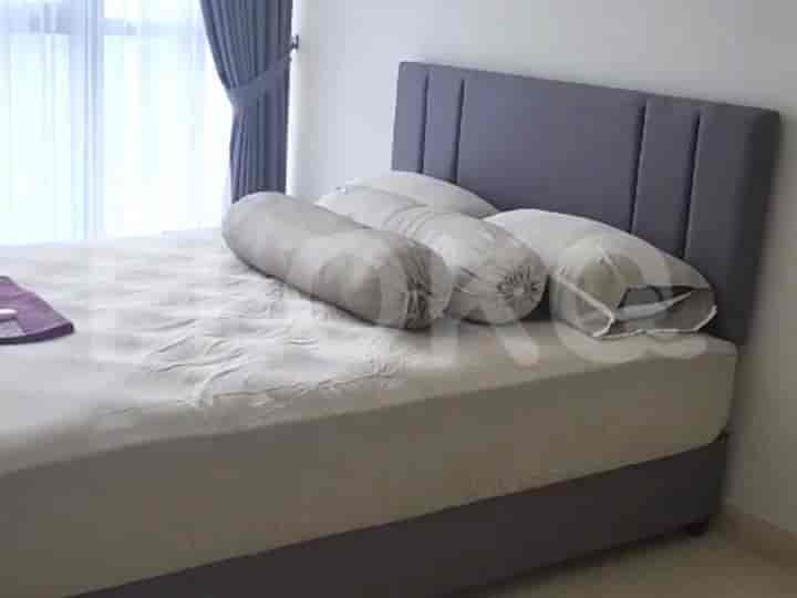 Bedroom with a double bed, side tables, and window.
