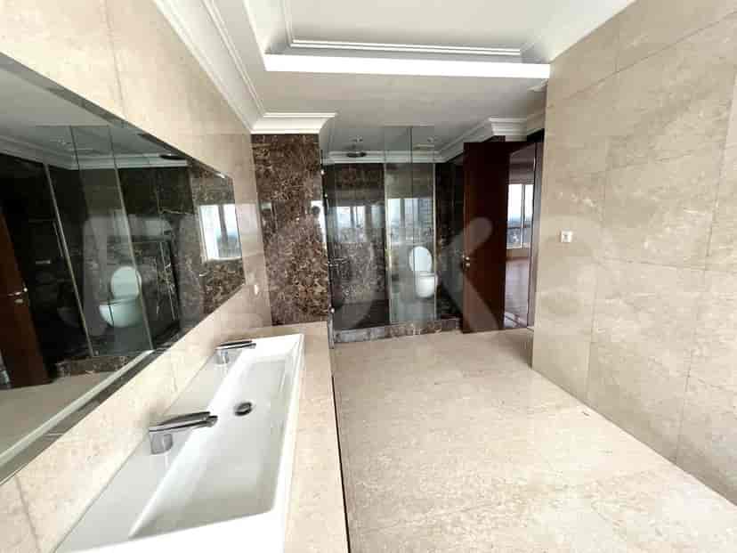 Elegant bathroom with a standalone bathtub and modern vanity.