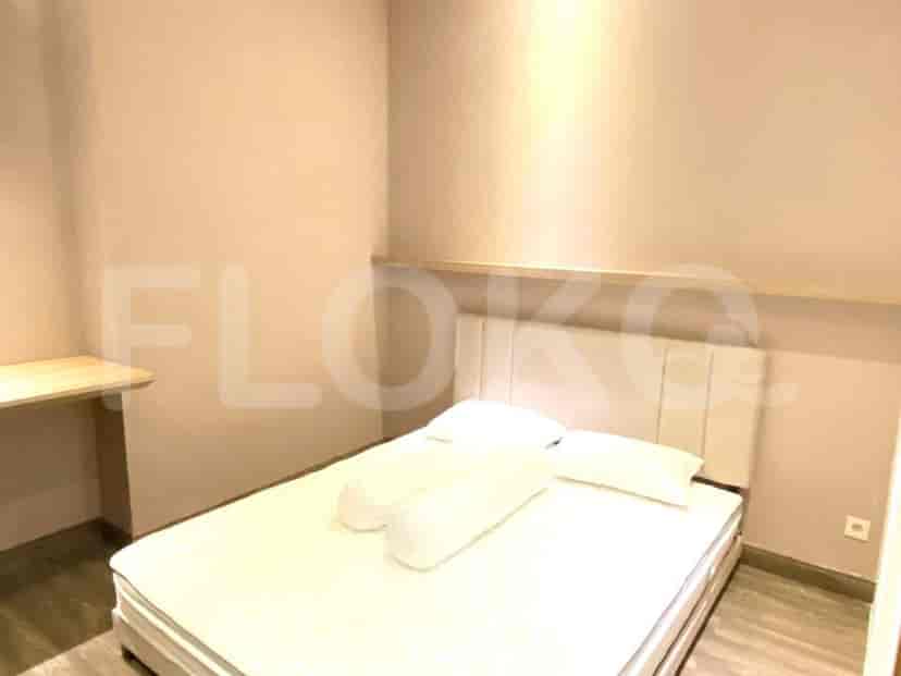 Bedroom with a bed and desk.