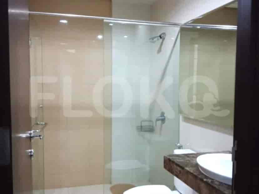 Bathroom with a glass shower and vanity.