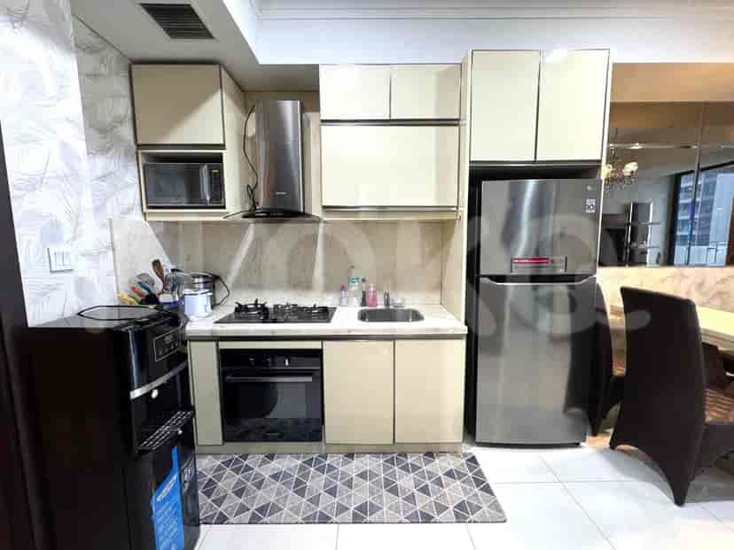 Well-equipped kitchen with appliances and storage.