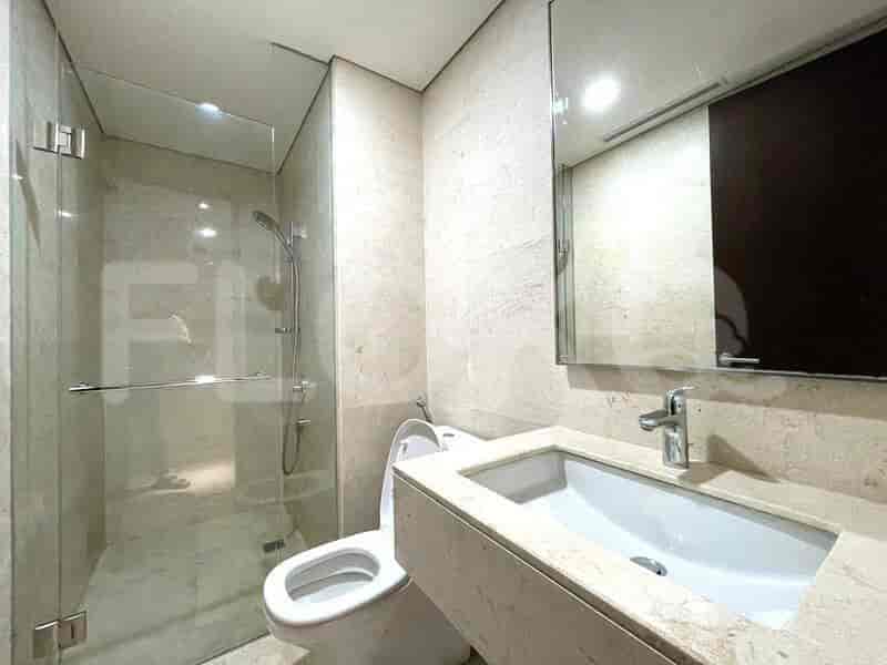 A modern bathroom with a walk-in shower.